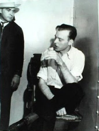 Harry Pierpont being interrogated in a Tucson, Arizona, jail cell