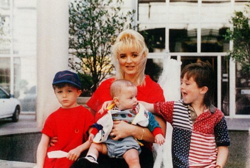 Darlie Routier with her three young sons in happier days. The youngest, Drake, was with his father upstairs and was not harmed (Dallas Morning News)