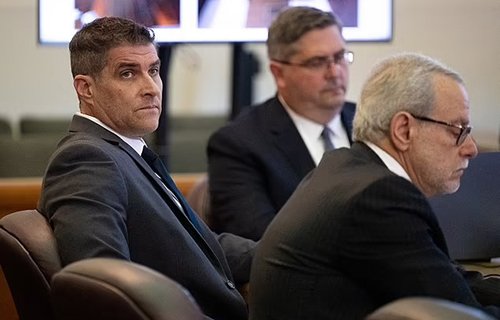 Dan Serafini (L) with is lawyers in court (Sacramento Bee)